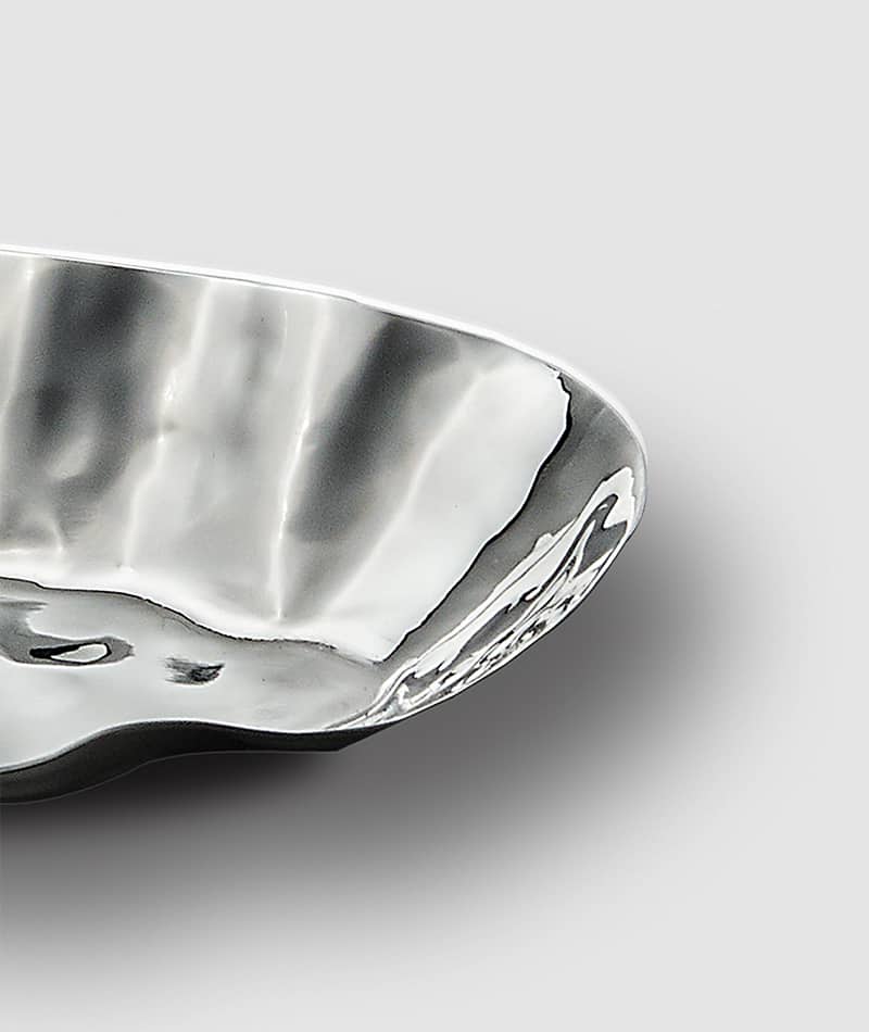 close up image of blossom stainless steel tray