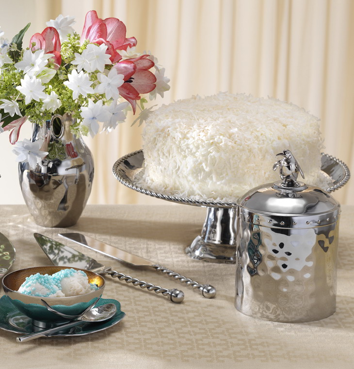 Mary Jurek Design serveware including a cake stand, ice cream bucket, and flower vase 