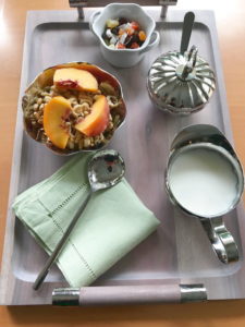 Serveware including a tray with fruit bowls and creamer 
