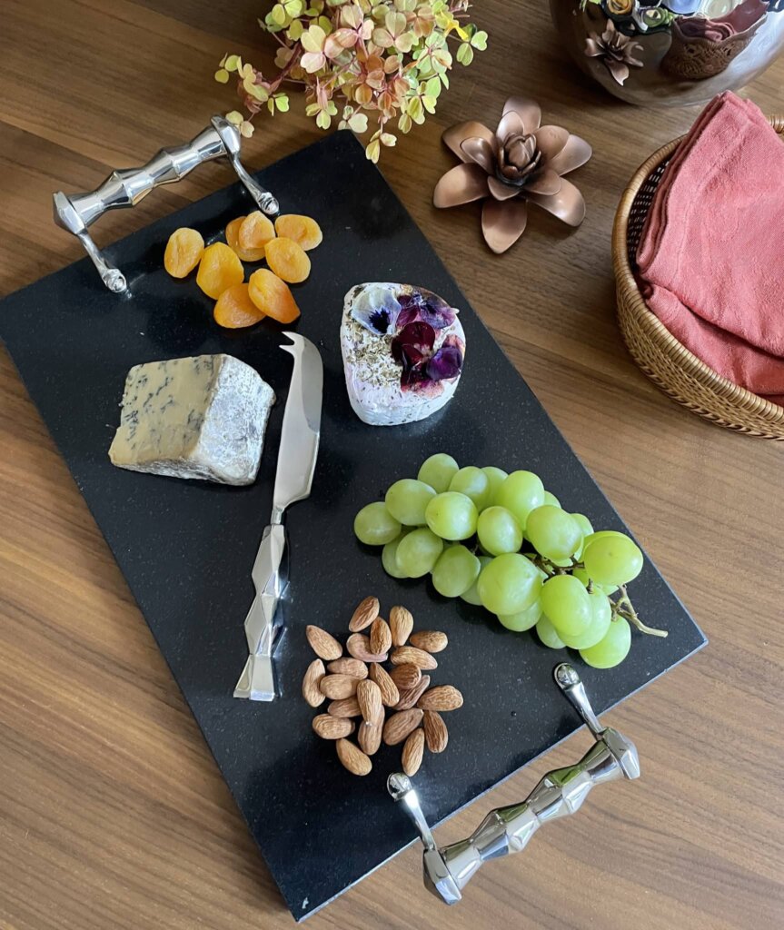 The Ibiza cheese tray and cheese knife with various accouterments