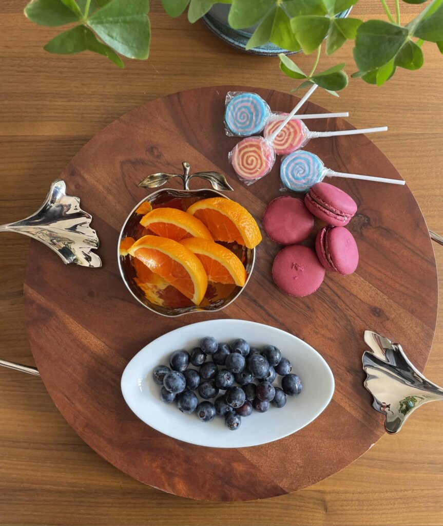 The Ginkgo Wood Platter w/ Handles with assorted treats